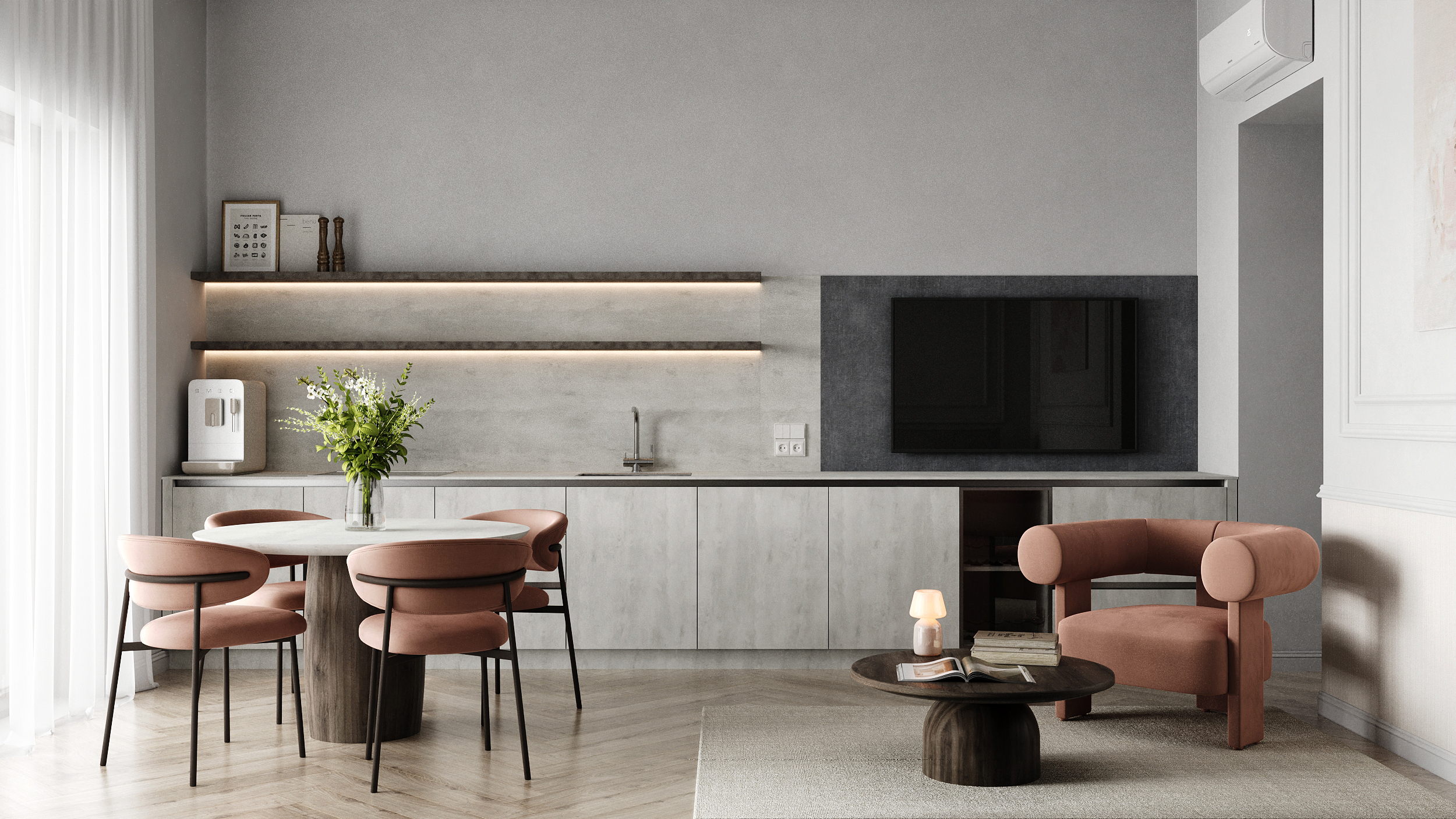 Open kitchen run with a round dining table, lounge chair and television